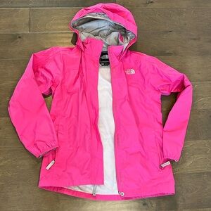 North Face girls large pink rain coat great used condition. Zippered pockets